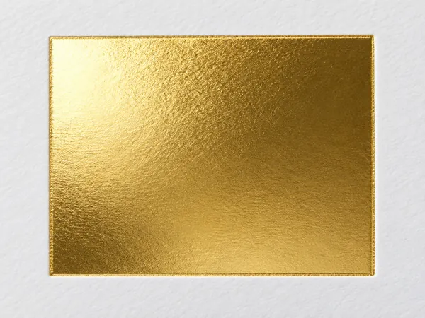 Macro illustration: a crisp-edged gold foil block stamped on unprinted white board.